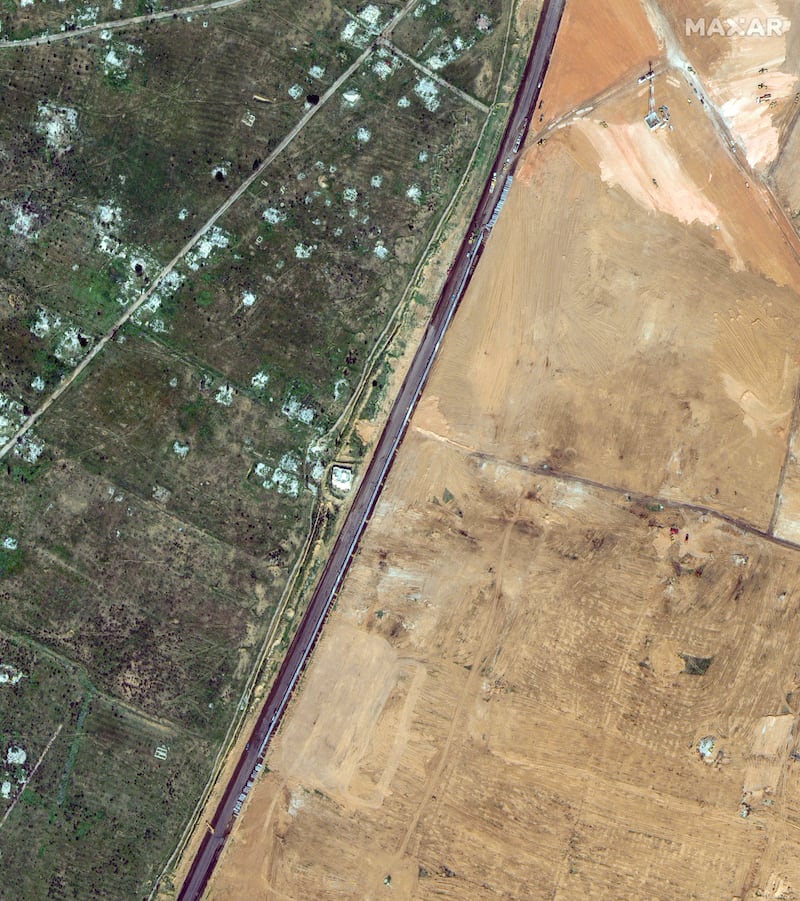 A satellite image shows the construction of a new wall along the Egypt-Gaza border. Maxar Technologies via Reuters