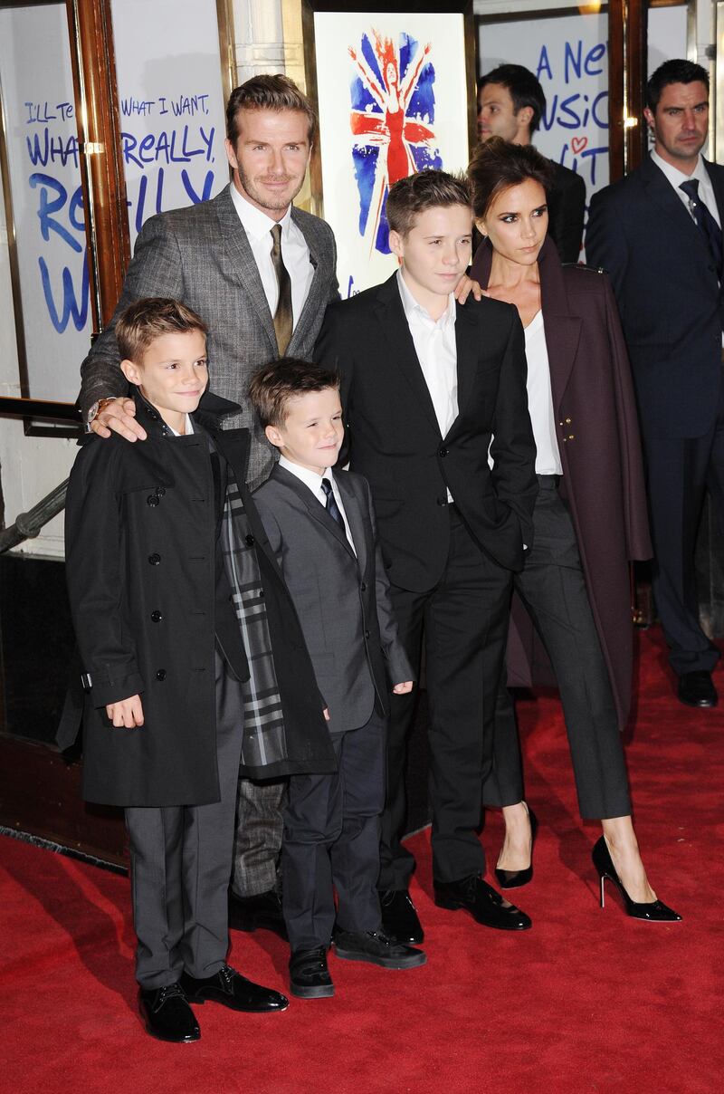 LONDON, UNITED KINGDOM - DECEMBER 11: Romeo Beckham, David Beckham, Cruz Beckham, Brooklyn Beckham and Victoria Beckham attend the press night of 'Viva Forever', a musical based on the music of The Spice Girls at Piccadilly Theatre on December 11, 2012 in London, England. (Photo by Stuart Wilson/Getty Images)