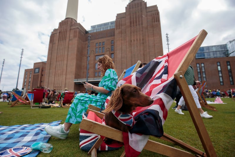 Members of the public enjoy the coronation weekend next to Battersea Power Station in London. Getty Images