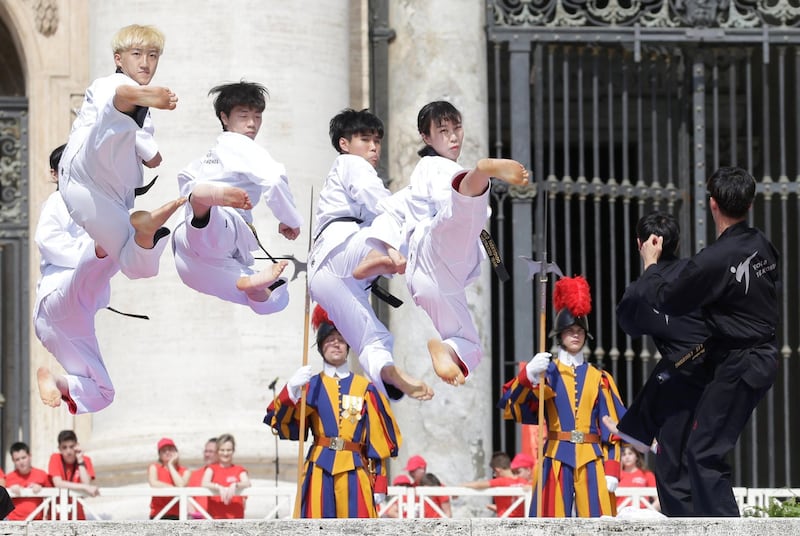Taekwondo athletes from Korea perform for Pope Francis during the Wednesday general audience in Saint Peter's square at the Vatican. Max Rossi / Reuters