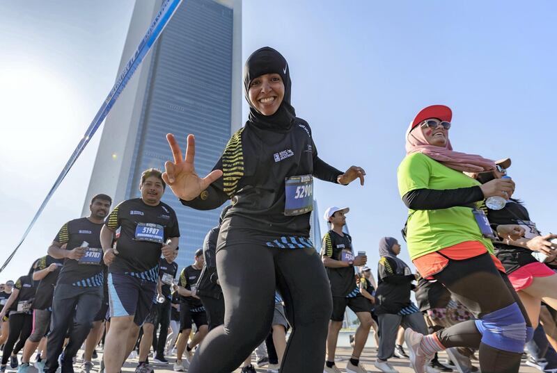 Abu Dhabi, United Arab Emirates - December 06, 2019: Athletes run the 5K the ADNOC Abu Dhabi marathon 2019. Friday, December 6th, 2019. Abu Dhabi. Chris Whiteoak / The National