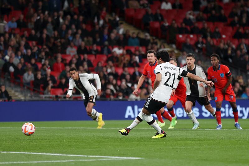 Ilkay Guendogan scores Germany's first from the penalty spot. Getty