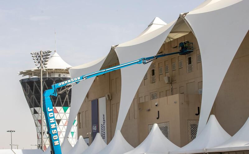 The canopies are hosed down with high-pressure water hoses. Courtesy Yas Marina Circuit