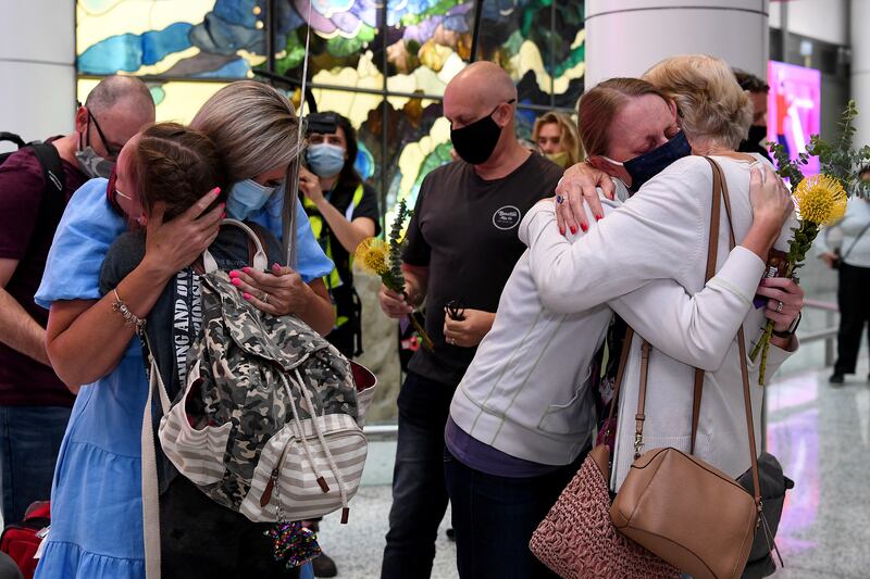 Tearful reunions at Sydney's international airport. Reuters