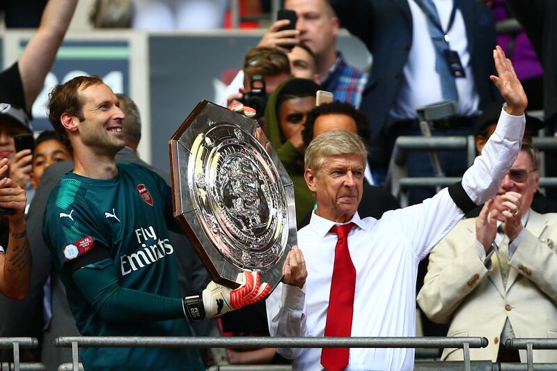 Arsenal's Petr Cech and Arsene Wenger celebrate with The Community Shield. Dan Istitene / Getty Images