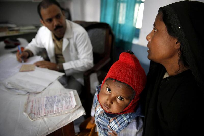 Anwar, 4, a tuberculosis patient, at a check-up in Kotawa near Varanasi in Uttar Pradesh. Rajesh Kumar Singh / AP Photo