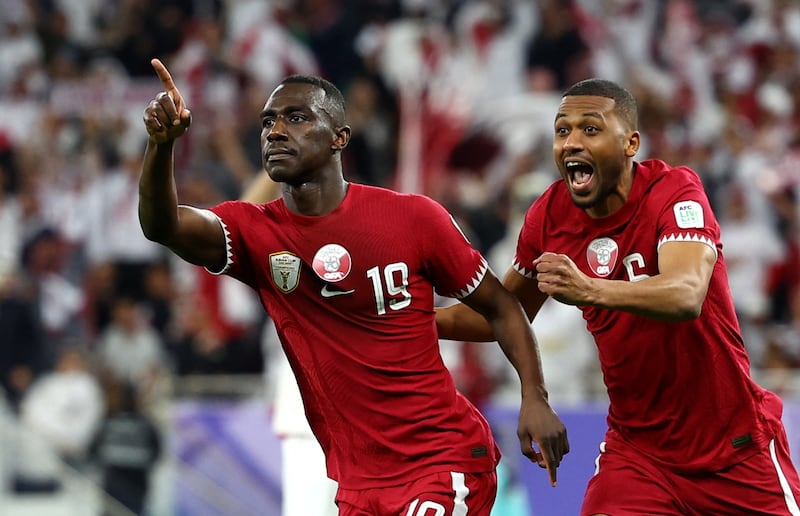 Almoez Ali celebrates scoring Qatar's third goal in their 3-2 Asian Cup semi final win over Iran at Al Thumama Stadium. Reuters