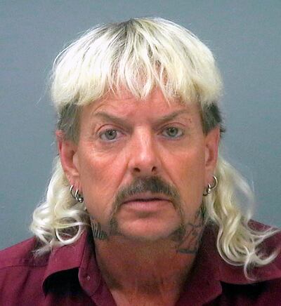 FILE - This file photo provided by the Santa Rosa County Jail in Milton, Fla., shows Joseph Maldonado-Passage, also known as "Joe Exotic." Maldonado-Passage was convicted in an unsuccessful murder-for-hire plot against Carole Baskin, the founder of Big Cat Rescue, who he has repeatedly accused of killing her husband Jack â€œDonâ€ Lewis. Lewis' unsolved 1997 disappearance and Maldonado-Passage's accusations are the subject of new Netflix series â€œTiger King.â€ (Santa Rosa County Jail via AP, File)