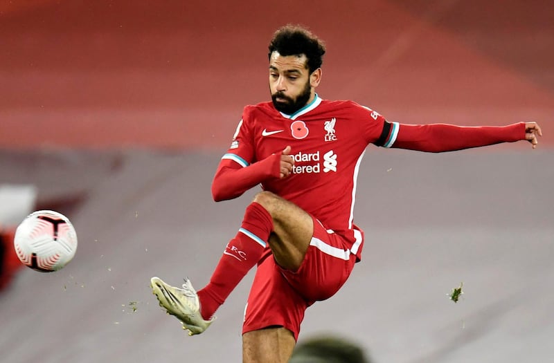 FILE PHOTO: Soccer Football - Premier League - Liverpool v West Ham United - Anfield, Liverpool, Britain - October 31, 2020 Liverpool's Mohamed Salah in action Pool via REUTERS/Peter Powell EDITORIAL USE ONLY. No use with unauthorized audio, video, data, fixture lists, club/league logos or 'live' services. Online in-match use limited to 75 images, no video emulation. No use in betting, games or single club /league/player publications. Please contact your account representative for further details./File Photo