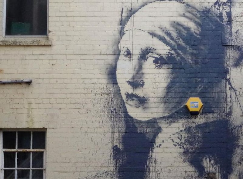 Banksy 'Girl With The Pierced Eardrum' appeared in 2014. Photo: Destination Bristol
