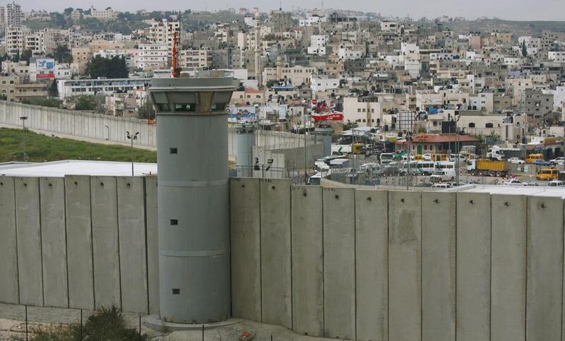 A tower on the West Bank separation wall, near the Qalandia checkpoint between Ramallah and Jerusalem. Atef Safadi / EPA