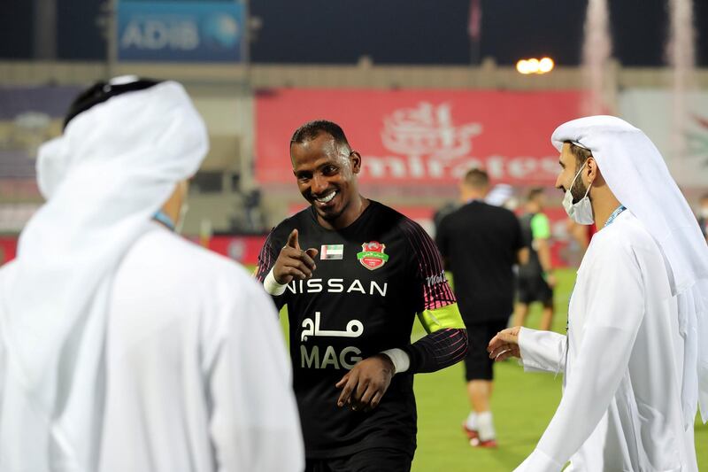 Sharjah, United Arab Emirates - Reporter: John McAuley. Sport. Shabab Al Ahli celebrate winning the match by penalties. Goal keeper Majed Naser. Shabab Al Ahli v Al Nasr in the Arabian Gulf Cup Final. Friday, April 9th, 2021. Sharjah. Chris Whiteoak / The National