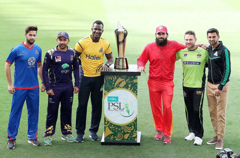 DUBAI , UNITED ARAB EMIRATES , FEB 20  – 2018 :- Left to Right - Imad Wasim , captain of the Karachi Kings , Sarfraz Ahmed , captain of the Quetta Gladiators ,  Darren Sammy , captain of the Peshawar Zalmi , Misbah – Ul - Haq , captain of the Islamabad United ,Brendon McCullum , captain of the Lahore Qalandars and Shoaib Malik , captain of the Multan Sultans with the trophy during the press conference of PSL T20 cricket tournament at Dubai International Cricket Stadium in Dubai. ( Pawan Singh / The National ) For Sports. Story by Paul Radley
 
