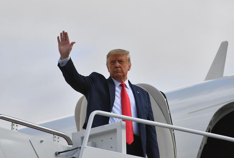 US President Donald Trump boards Air Force One at Andrews Air Force Base in Maryland.  AFP