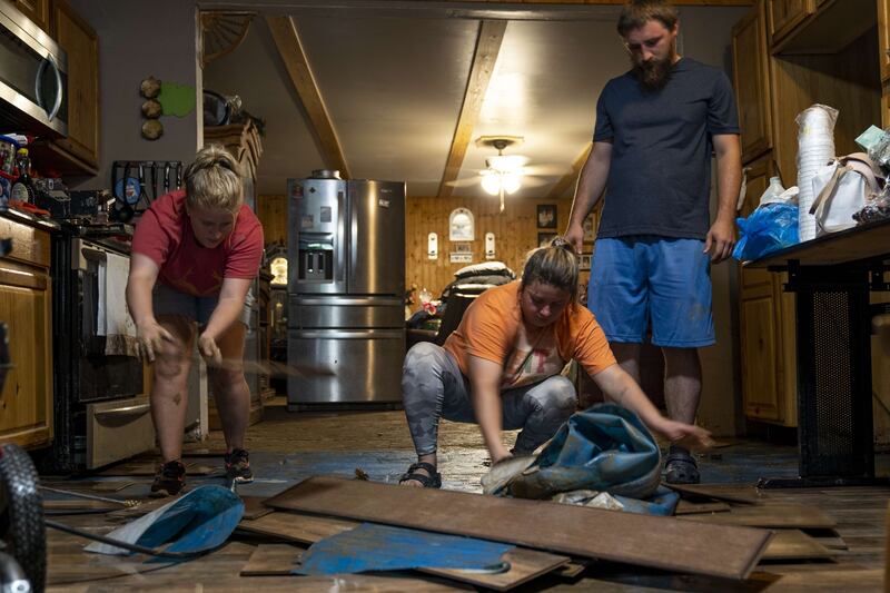 A clear-up after flooding at a house in Hazard. Getty Images / AFP
