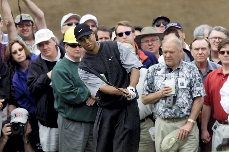 Tiger Woods of the US chips to the 2nd green, 05 April 2001, during the opening round of the 2001 Masters Golf Tournament at the Augusta National Golf Club in Augusta, Georgia. AFP PHOTO/Jeff HAYNES (Photo by JEFF HAYNES / AFP)