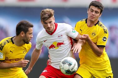 Soccer Football - Bundesliga - RB Leipzig v Borussia Dortmund - Red Bull Arena, Leipzig, Germany - June 20, 2020 RB Leipzig's Timo Werner in action with Borussia Dortmund's Giovanni Reyna and Raphael Guerreiro, following the resumption of play behind closed doors after the outbreak of the coronavirus disease (COVID-19) Ronny Hartmann/Pool via REUTERS DFL regulations prohibit any use of photographs as image sequences and/or quasi-video
