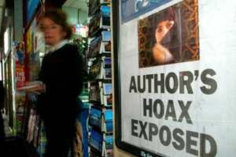 An unidentified woman walks out of a news agency in Sydney, Australia, Monday, July 26, 04, with a headline on the wall of "Author's Hoax Exposed". The best seller book "Forbidden Love" by author Norma Khouri, was  withdrawn from sale by the Australia publisher, Random House after allegations were made the book was not a true representation of her life and experiences. The publisher has advised bookshops to take it off their shelves until its authenticity could be proved.(AP Photo/Rob Griffith)