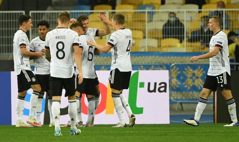 Germany's Leon Goretzka celebrates with teammates after scoring his team's second goal. AFP
