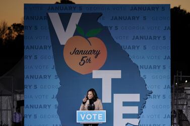 US Vice President-elect Kamala Harris, speaks during a 'Get Out The Vote' campaign event with Democratic Senate candidates Raphael Warnock and Jon Ossoff in Garden City, Georgia on January 3, 2021. Bloomberg