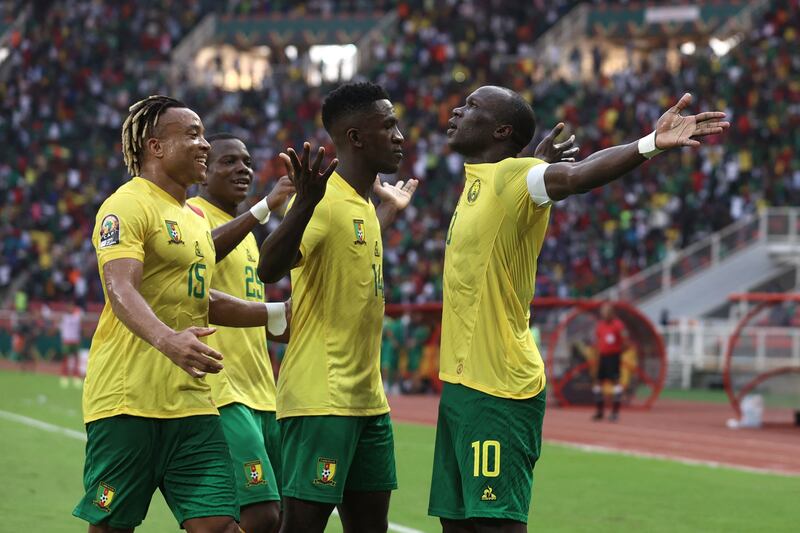 Cameroon forward Vincent Aboubakar, right, celebrates scoring against Cape Verde at Stade d'Olembe in Yaounde. AFP