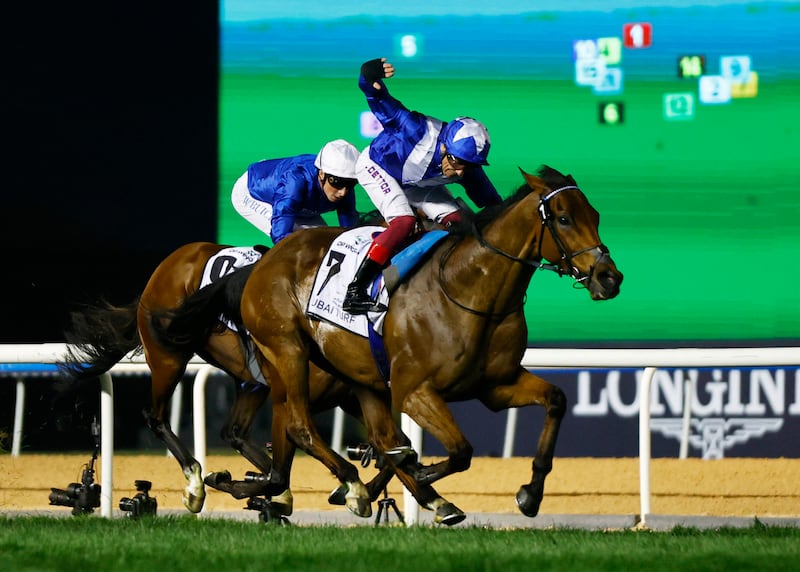 Frankie Dettori riding Lord North on his way to winning the $5 million Dubai Turf. Reuters