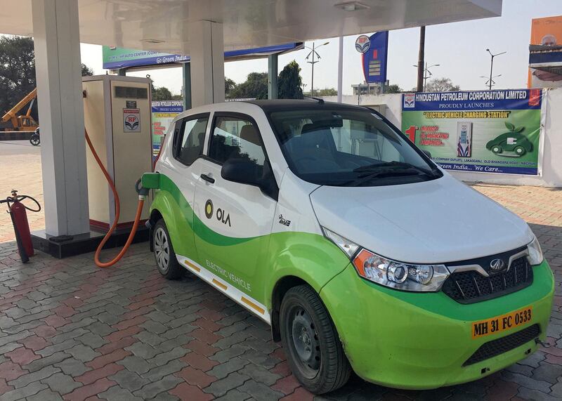 FILE PHOTO: Mahindra's, e2oPlus, operated by Indian ride-hailing company Ola, is seen at an electric vehicle charging station in Nagpur, India January 24, 2018. REUTERS/Aditi Shah/File Photo