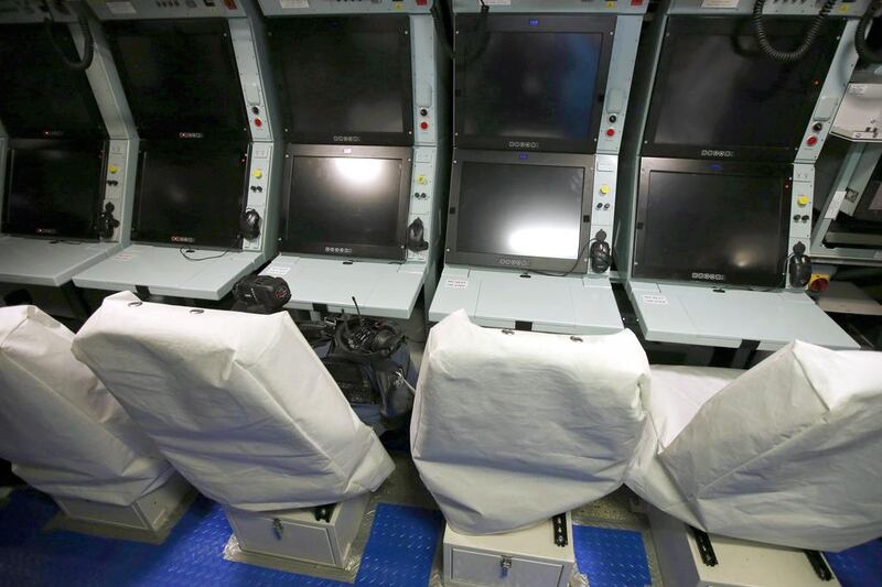 Computer screens in the control room onboard HMS Artful, which is completing a series of commissioning activities before its launch this year. Phil Noble / Reuters