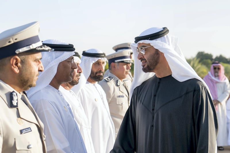 AL AIN, ABU DHABI, UNITED ARAB EMIRATES - December 04, 2017: HH Sheikh Mohamed bin Zayed Al Nahyan, Crown Prince of Abu Dhabi and Deputy Supreme Commander of the UAE Armed Forces (R), receives members of Abu Dhabi Police, during a barza, at Al Maqam Palace.


( Rashed Al Mansoori / Crown Prince Court - Abu Dhabi )
---