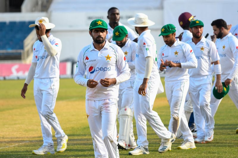 Babar Azam of Pakistan leads his team off the field at the end of the Jamaica Test.