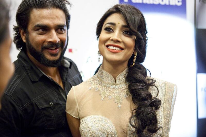 R.Madhavan shares a moment with Shreya Sarani, South Indian actress at the South Indian International Movie Awards. Razan Alzayani / The National