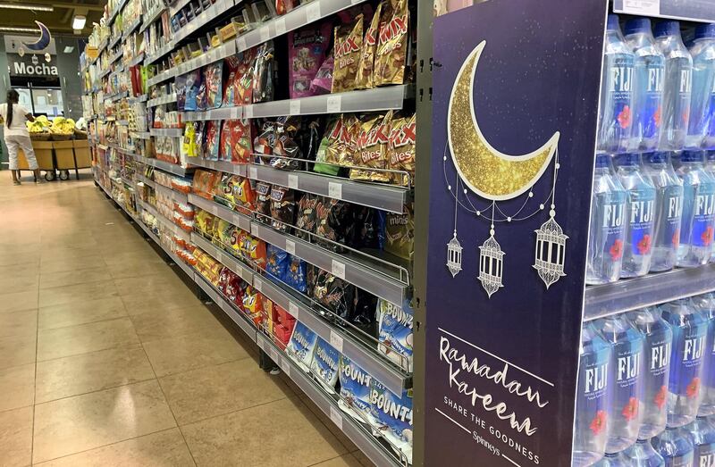 DUBAI, UNITED ARAB EMIRATES , April 20– 2020 :- Ramadan decoration at the Spinneys in Al Barsha in Dubai.  Dubai is conducting 24 hours sterilisation programme across all areas and communities in the Emirate and told residents to stay at home. UAE government told residents to wear face mask and gloves all the times outside the home whether they are showing symptoms of Covid-19 or not.  (Pawan Singh / The National) For News/Online