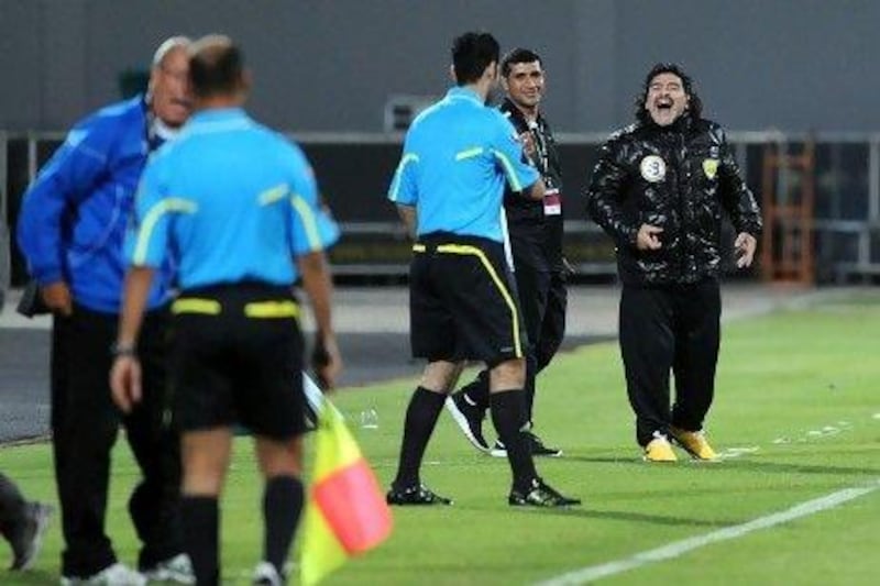 Diego Maradona, right, is unhappy with the Al Wasl's dealings in the transfer market.