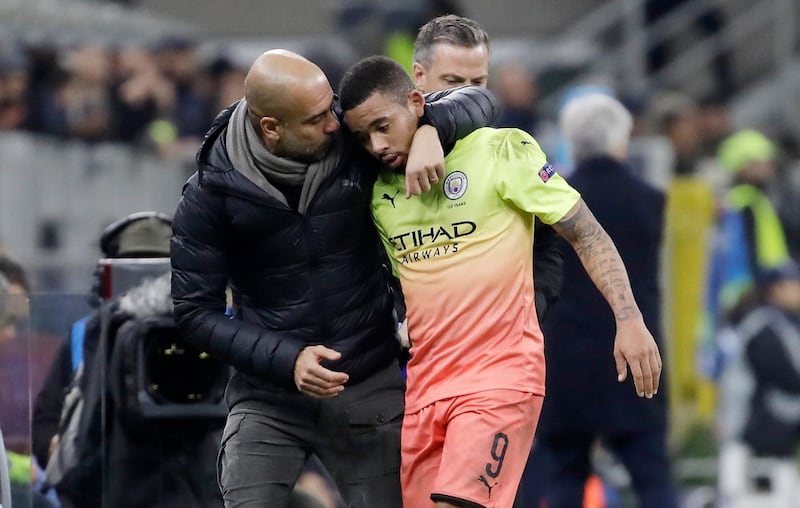 Manchester City manager Pep Guardiola, left, with Gabriel Jesus during Manchester City's Champions League draw at Atalanta on Wednesday. AP