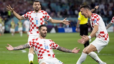 Marko Livaja (C) of Croatia celebrates scoring the 2-1 lead during the FIFA World Cup 2022 group F soccer match between Croatia and Canada at Khalifa International Stadium in Doha, Qatar, 27 November 2022.   EPA / Ali Haider
