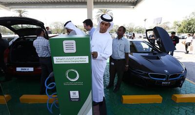 An electric car charging station at Dubai Electricity and Water Authority's HQ in Garhoud, Dubai. The government is one of the biggest buyers of electric cars - and there are plans to drive up private ownership too. Pawan Singh / The National 


