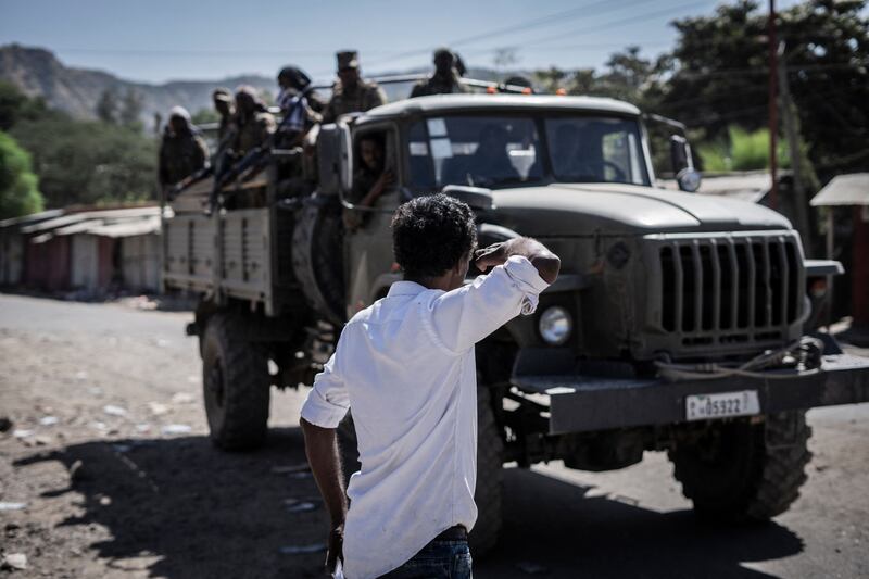 Members of the Ethiopian National Defence Force pass through Shewa Robit, Ethiopia. Photo: AFP