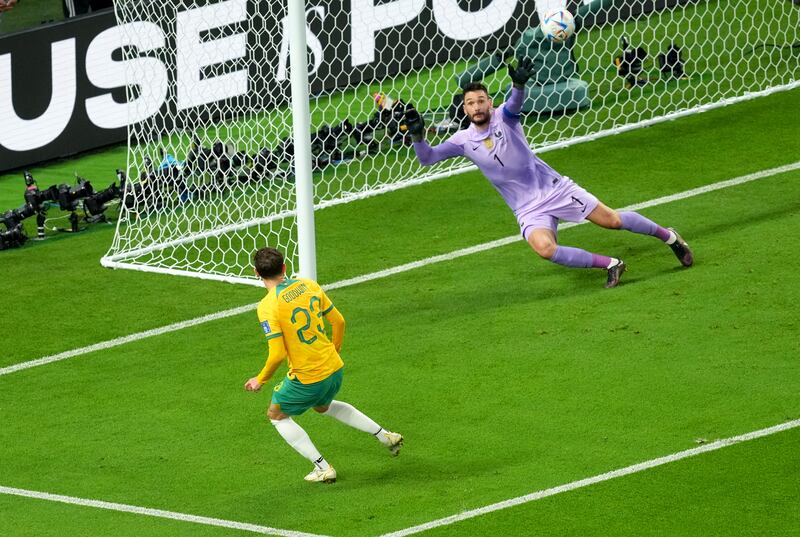 Australia's Craig Goodwin scores their first goal. PA