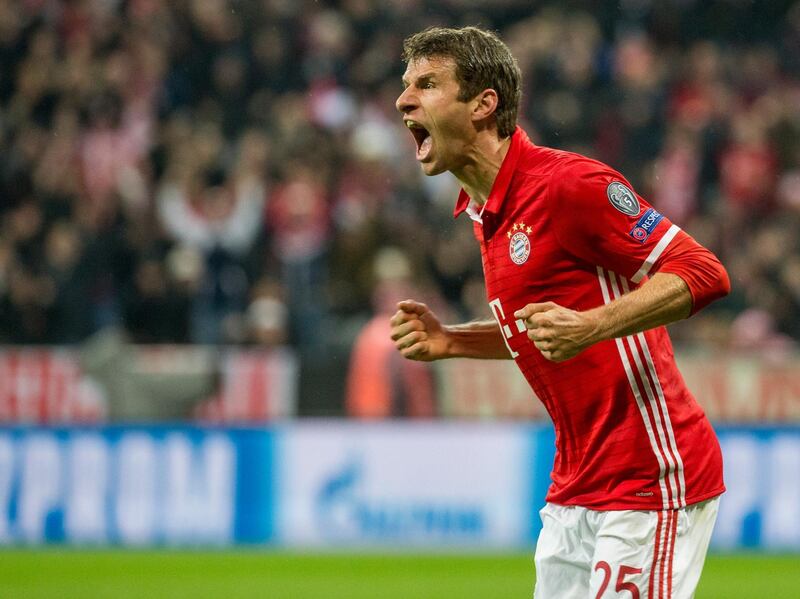 MUNICH, GERMANY - OCTOBER 19: Thomas Mueller of FC Bayern Munich celebrates the opening goal during the UEFA Champions League group D match between Bayern Munich and PSV Eindhoven at Allianz Arena on October 19, 2016 in Munich, Germany. (Photo by Marc Mueller/Bongarts/Getty Images)