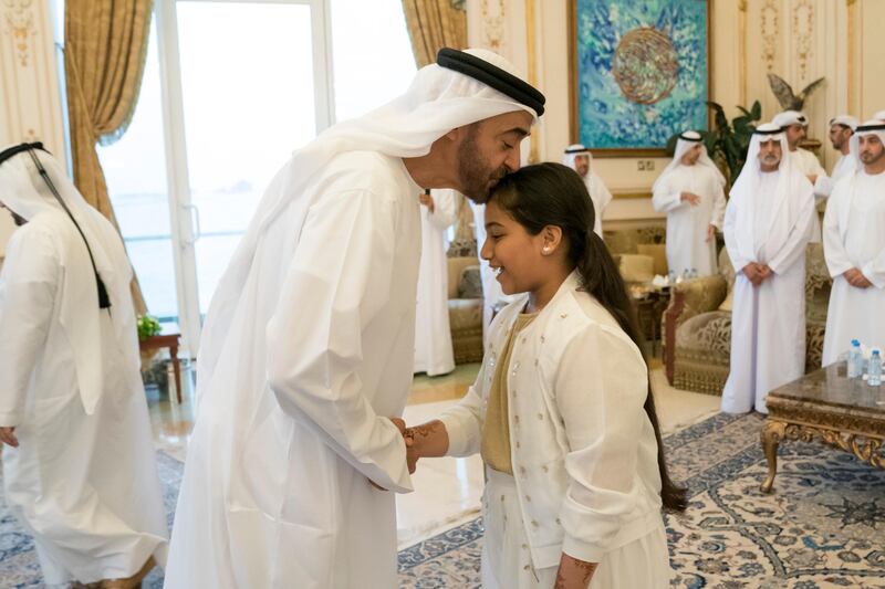 ABU DHABI, UNITED ARAB EMIRATES - October 09, 2017: HH Sheikh Mohamed bin Zayed Al Nahyan, Crown Prince of Abu Dhabi and Deputy Supreme Commander of the UAE Armed Forces (L) receives martyrs' children, who have excelled in school, during a Sea Palace barza. 

( Hamad Al Kaabi / Crown Prince Court - Abu Dhabi )
—