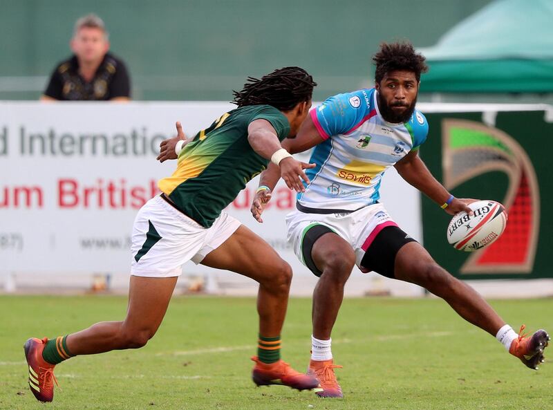 Dubai, United Arab Emirates - December 07, 2019: Luke Masirewa of Speranza takes on the South Africa defence in the game between South Africa 7s Academy and Speranza 22 in the Int Invitational at the HSBC rugby sevens series 2020. Saturday, December 7th, 2019. The Sevens, Dubai. Chris Whiteoak / The National