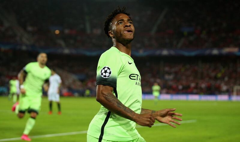 Manchester City’s Raheem Sterling celebrates his goal against Sevilla in the Champions League on Tuesday night. Ian Walton / Getty Images