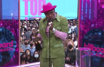 In this video image provided by NBC, DaBaby accepts the top rap song award for "ROCKSTAR" during the Billboard Music Awards on Sunday, May 23, 2021. (NBC via AP)