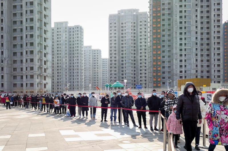 A queue for a Covid-19 test centre in Tianjin on Sunday. Large number of commuters work and live in Tianjin and Beijing. Photo: EPA