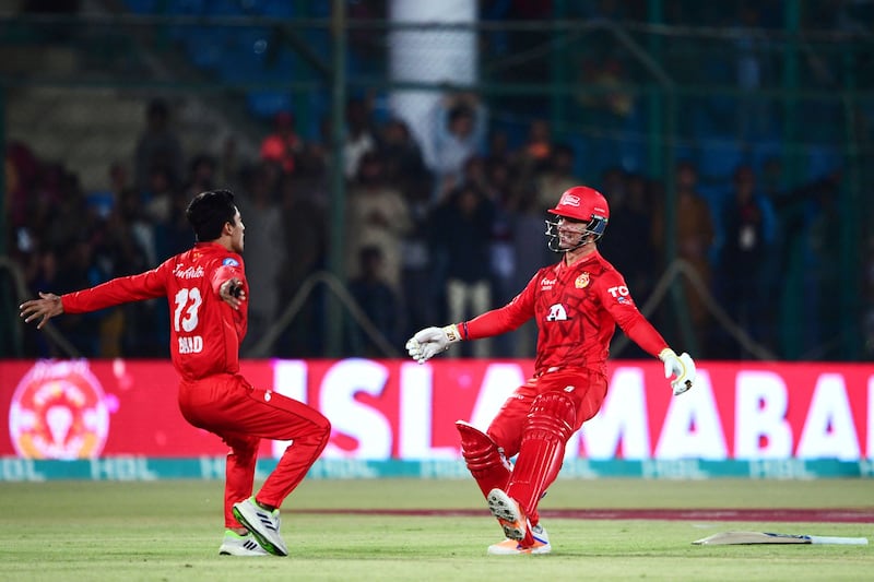 Islamabad United's Hunain Shah, right, and Ubaid Shah celebrate their team's victory after Hunain scored the winning runs against Multan Sultans off the final ball. AFP