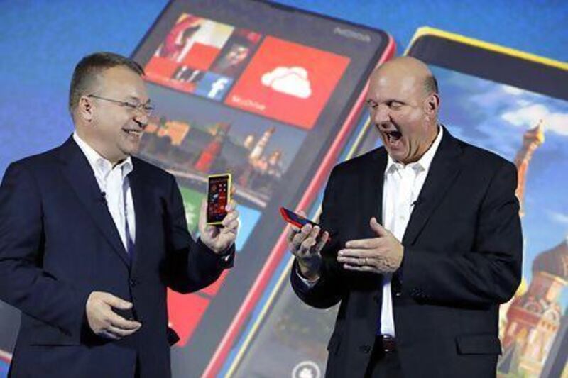 Stephen Elop, the chief executive of Nokia, left, with Steve Ballmer, the chief executive of Microsoft. In Finland, Mr Elop is regarded as a Trojan Horse for Microsoft. Alexander Zemlianichenko Jr / Bloomberg News