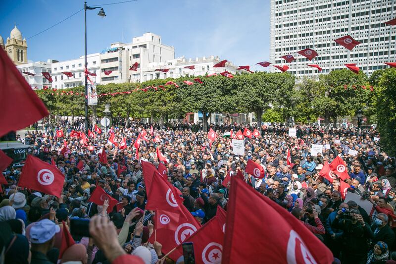 Demonstrators gather during a protest against Tunisian President Kais Saied, in the capital Tunis on Sunday. AP