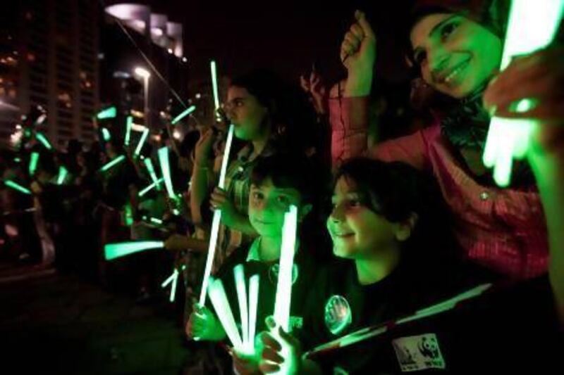 Participants of the Earth Hour celebrations which took place along the Abu Dhabi corniche on 31 March, 2012. Christopher Pike / The National