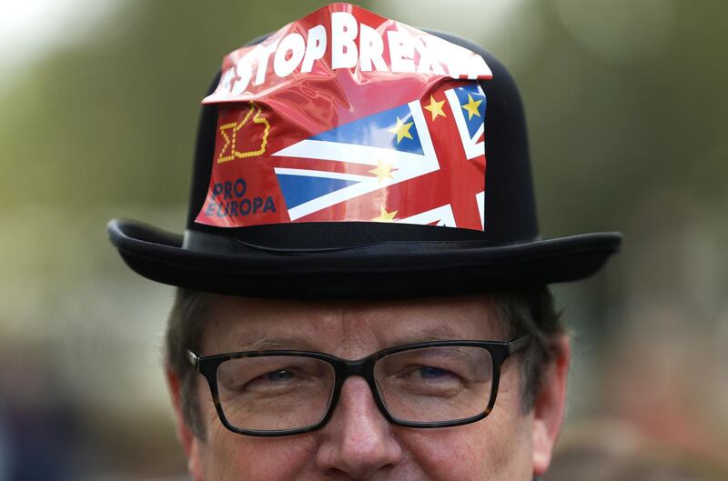 A demonstrator wearing a hat attends a "Stop Brexit" protest. Reuters