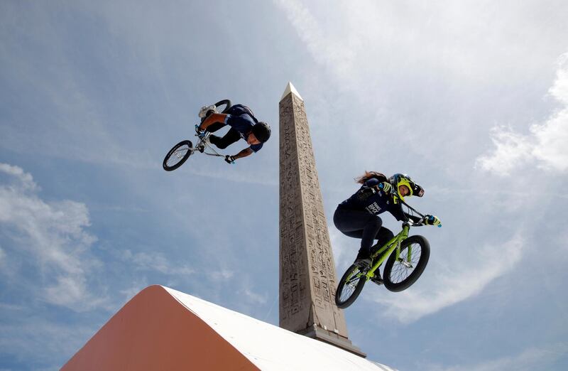 France's BMX team put on a show at Place de la Concorde, which has been turned into a giant Olympic park ahead of the Paris 2024 Olympics, in Paris, France.  Reuters